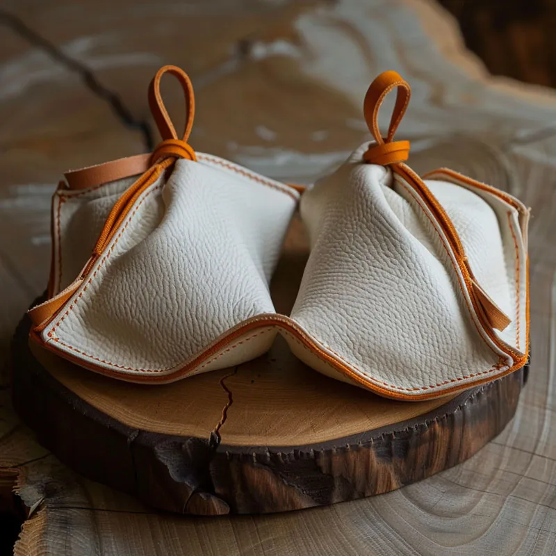 Ano ang mga pakinabang ng paggamit ng isang katad na supot ng alahas?